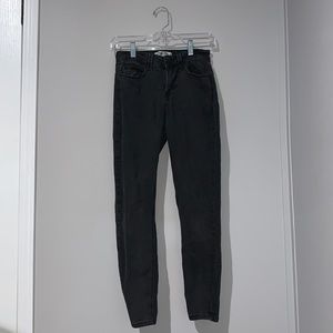 Faded Mid Rise Skinny Jeans